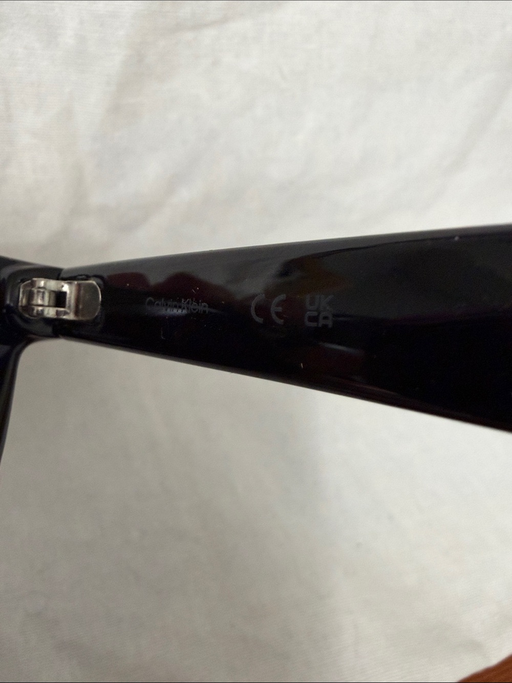 Calvin Klein Glossy Black Sunglasses with Smoke Lenses - Picture 3 of 5